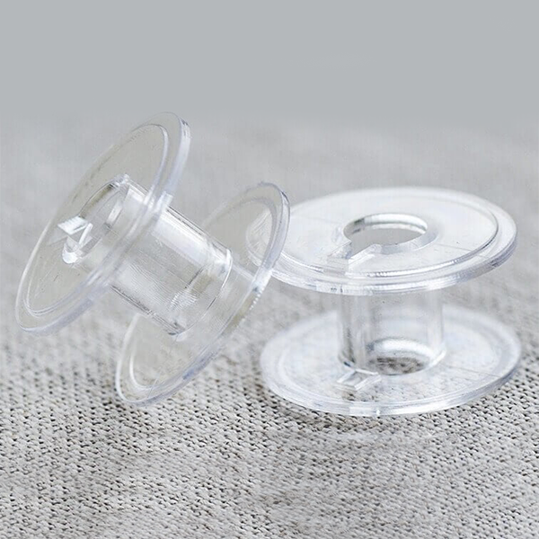 Sewing machine bobbins
