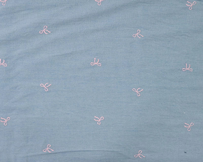 Light blue chambray with an embroidered denim bow